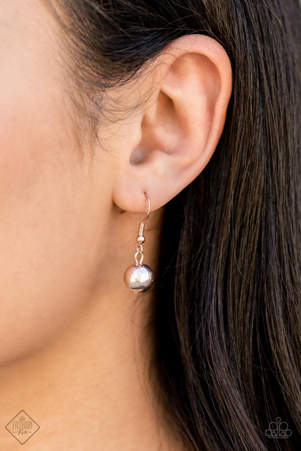 Paparazzi Accessories Nautical Nirvana - Rose Gold A collection of classic white pearls, Pale Rosette pearls glazed in a reflective finish, and iridescent teardrops dance along the collar in an ethereal display. Rose gold frames encase each bead, adding a