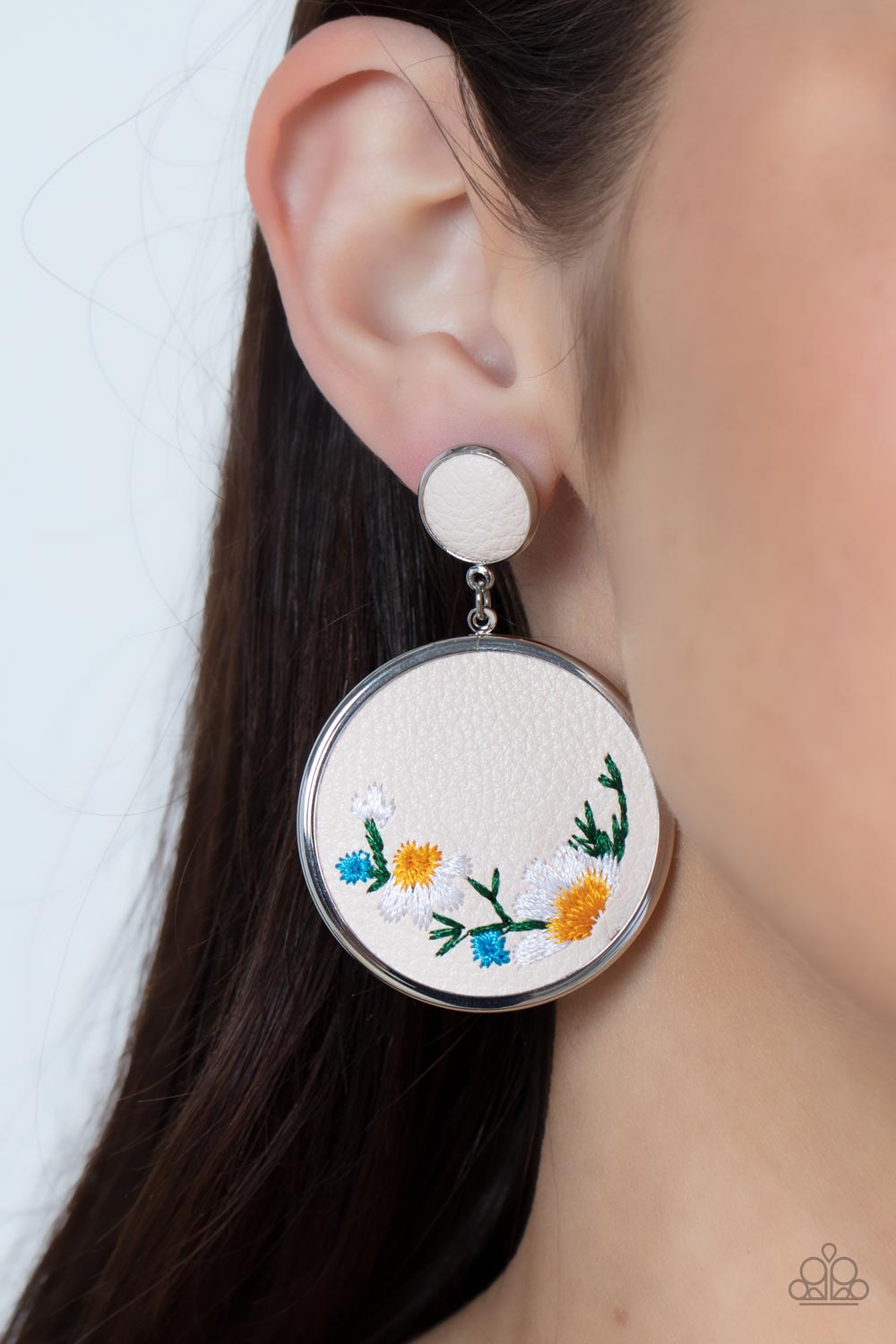 Paparazzi Accessories Embroidered Gardens - Multi A small leather disc, encased in a simple silver frame, anchors a larger leather circle that is adorned with fanciful embroidered flowers creating a whimsical lure. Earring attaches to a standard post fitt