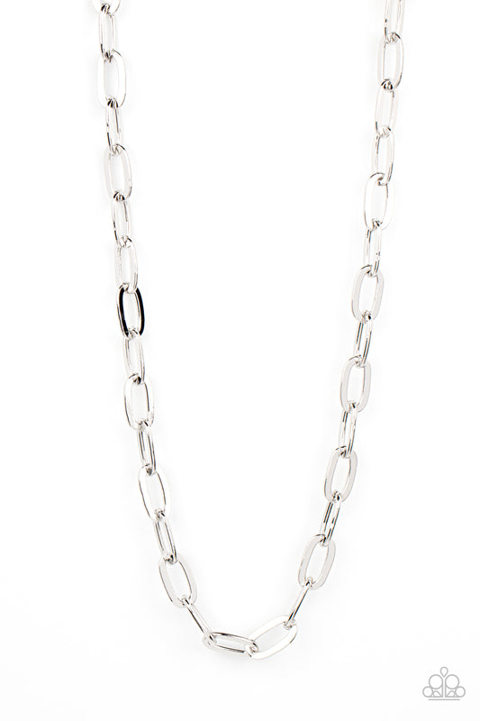 Paparazzi Accessories Urban Quarterback - Silver Featuring a high sheen finish, a shiny collection of oversized silver oval links boldly interlock across the chest for a grit-inspired look. Features an adjustable clasp closure. Sold as one individual neck