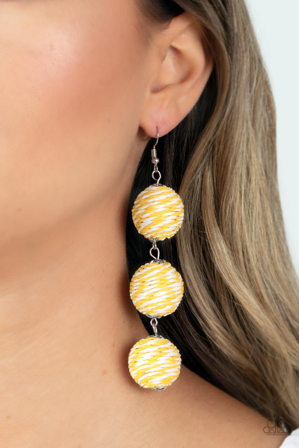 Paparazzi Accessories Laguna Lanterns - Yellow A woven collection of Illuminating and white crepe-like strings ornately wraps around three hanging beads, reminiscent of decorative party lanterns. Earring attaches to a standard fishhook fitting. Sold as on