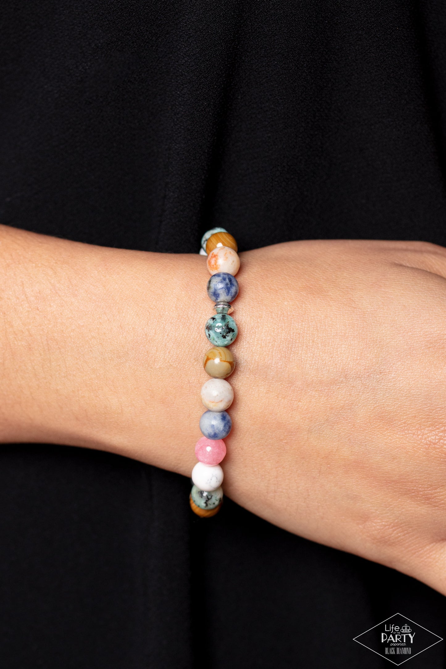 Paparazzi Accessories Stone Chakra - Multi Infused with silver accents, a colorful collection of natural stones are threaded along a stretchy band around the wrist for a tranquil look. Sold as one individual bracelet. Jewelry