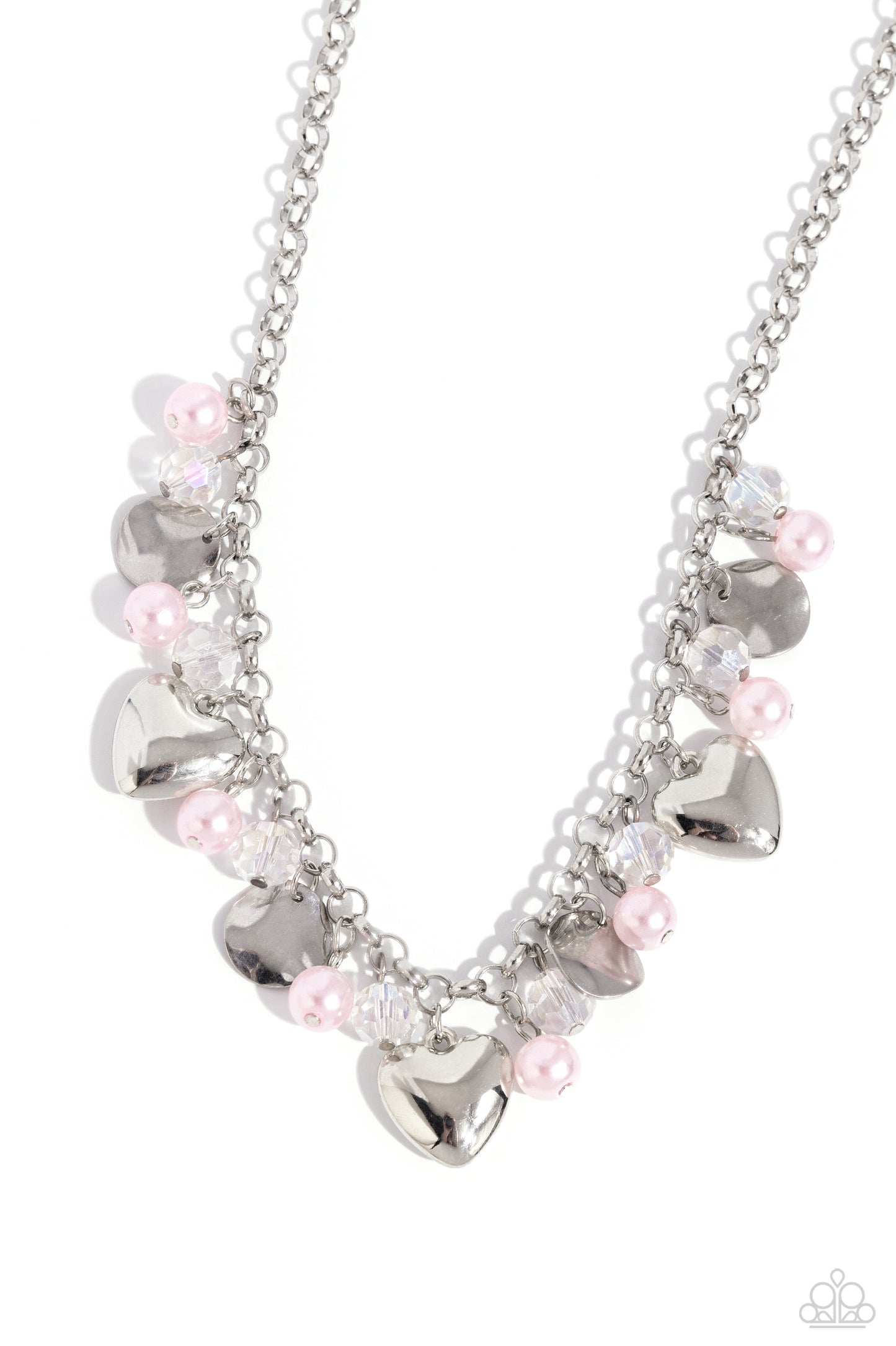 Paparazzi Accessories True Loves Trove - Pink A flirtatious collection of pink pearls, glassy white crystal-like beads, crinkled silver discs, and oversized locket inspired silver heart frames dance from a shiny silver chain, resulting in a romantic fring