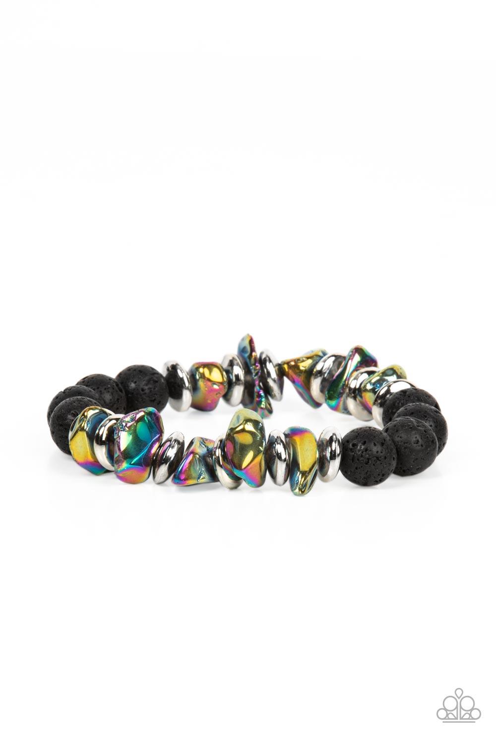 Paparazzi Accessories Volcanic Vacay - Multi An earthy collection of black lava rock beads, dainty silver discs, and oil spill metallic pebbles are threaded along a stretchy band around the wrist, resulting in an edgy look. Sold as one individual bracelet