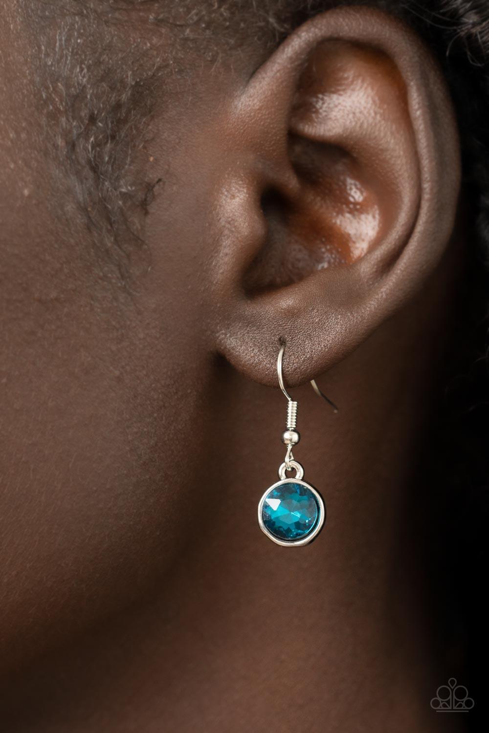 Paparazzi Accessories Pampered Powerhouse - Multi Encased in shiny silver frames, a glitzy collection of blue, yellow, and pink rhinestones gradually increase in size as they link below the collar for a flawless finish. Features an adjustable clasp closur