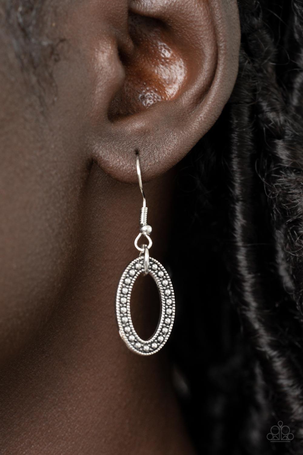 Paparazzi Accessories Mystical Mineral - Multi Featuring a colorful multicolored terrazzo finish, a faceted faux stone swings from a row of studded silver rings, flat silver hoops, and oversized silver fittings, creating an earthy pendant below the collar