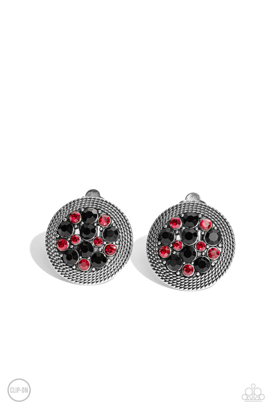 Paparazzi Accessories Stellar Status - Multi A glitzy collection of red and black rhinestones are encircled with a silver rope-like border, resulting in a smoldering centerpiece. Earring attaches to a standard clip-on fitting. Sold as one pair of clip-on