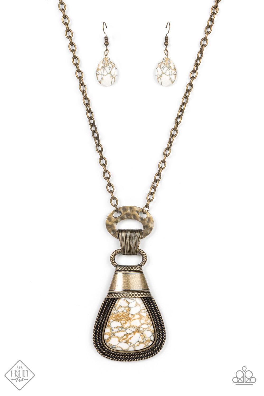 Paparazzi Accessories Rodeo Royale - Brass An earthy brown and white marbled stone is encased in a brass frame made up of layers of rope-like texture and topped with an antiqued brass adornment stamped in rustic patterns. The robust pendant swings from a