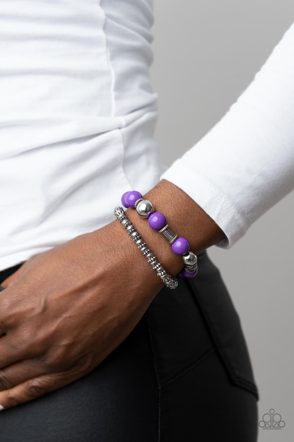 Paparazzi Accessories Walk This SWAY - Purple Infused with a dainty strand of ornate silver accents, an oversized collection of purple beads, silver beads, and textured silver accents are threaded along stretchy bands around the wrist for a vivacious pop