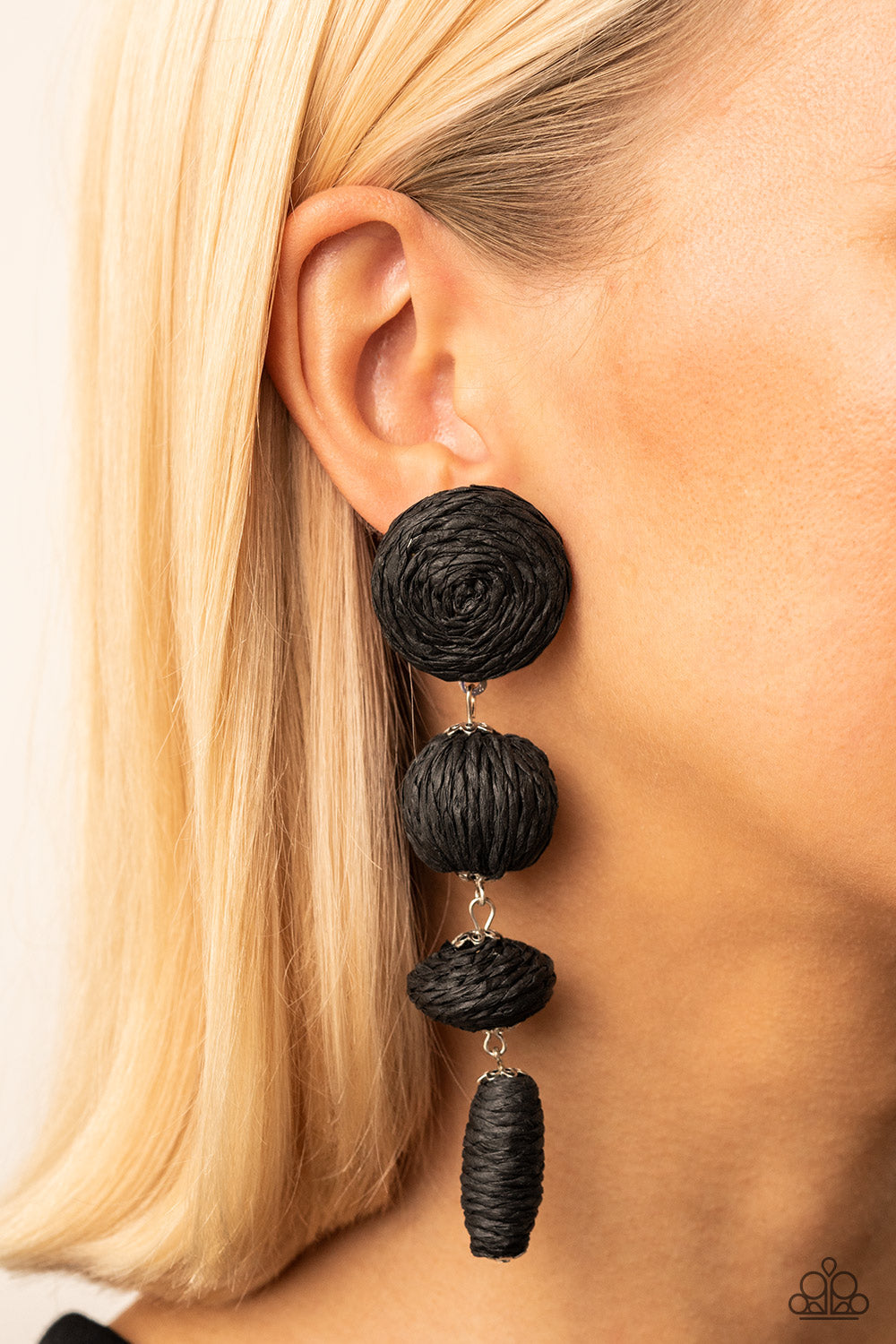 Paparazzi Accessories Twine Tango - Black Strands of black crepe-like twine wraps around circle, sphere, oval, and oblong frames that delicately connect into a decorative tassel for a trendy homespun finish. Earring attaches to a standard post fitting. So