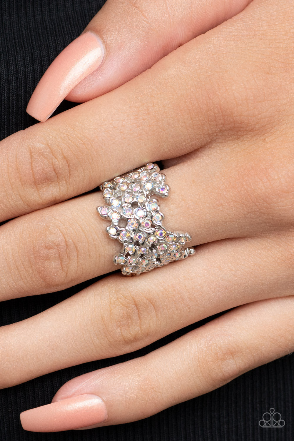 Paparazzi Accessories Sizzling Shimmer - Multi Enhanced with shiny silver fittings, glittery iridescent rhinestones scatter across the finger for a subtle shimmer. Features a stretchy band for a flexible fit. Sold as one individual ring. Jewelry