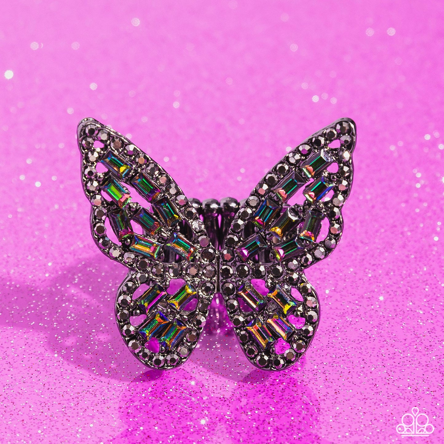 Paparazzi Accessories Flauntable Flutter - Multi Dainty oil spill emerald-cut rhinestones are sprinkled across the gunmetal wings of a butterfly that is encrusted in dauntless hematite rhinestones for a dramatically dazzling finish. Features a stretchy ba