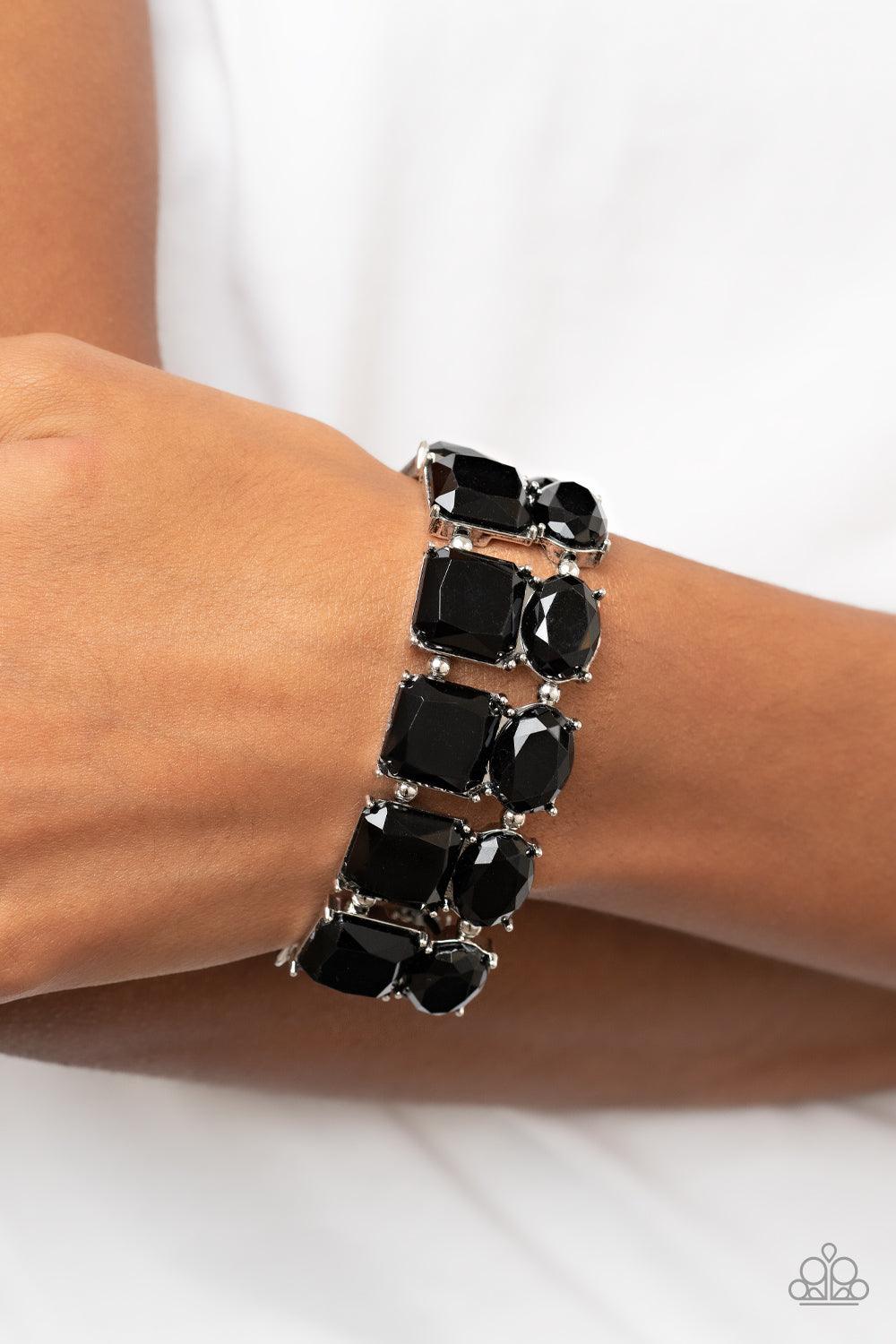 Paparazzi Accessories Dont Forget Your Toga - Black Separated by pairs of dainty silver beads, faceted stacks of oval and square cut black beads are threaded along a stretchy band around the wrist for a bold pop of color. Sold as one individual bracelet.