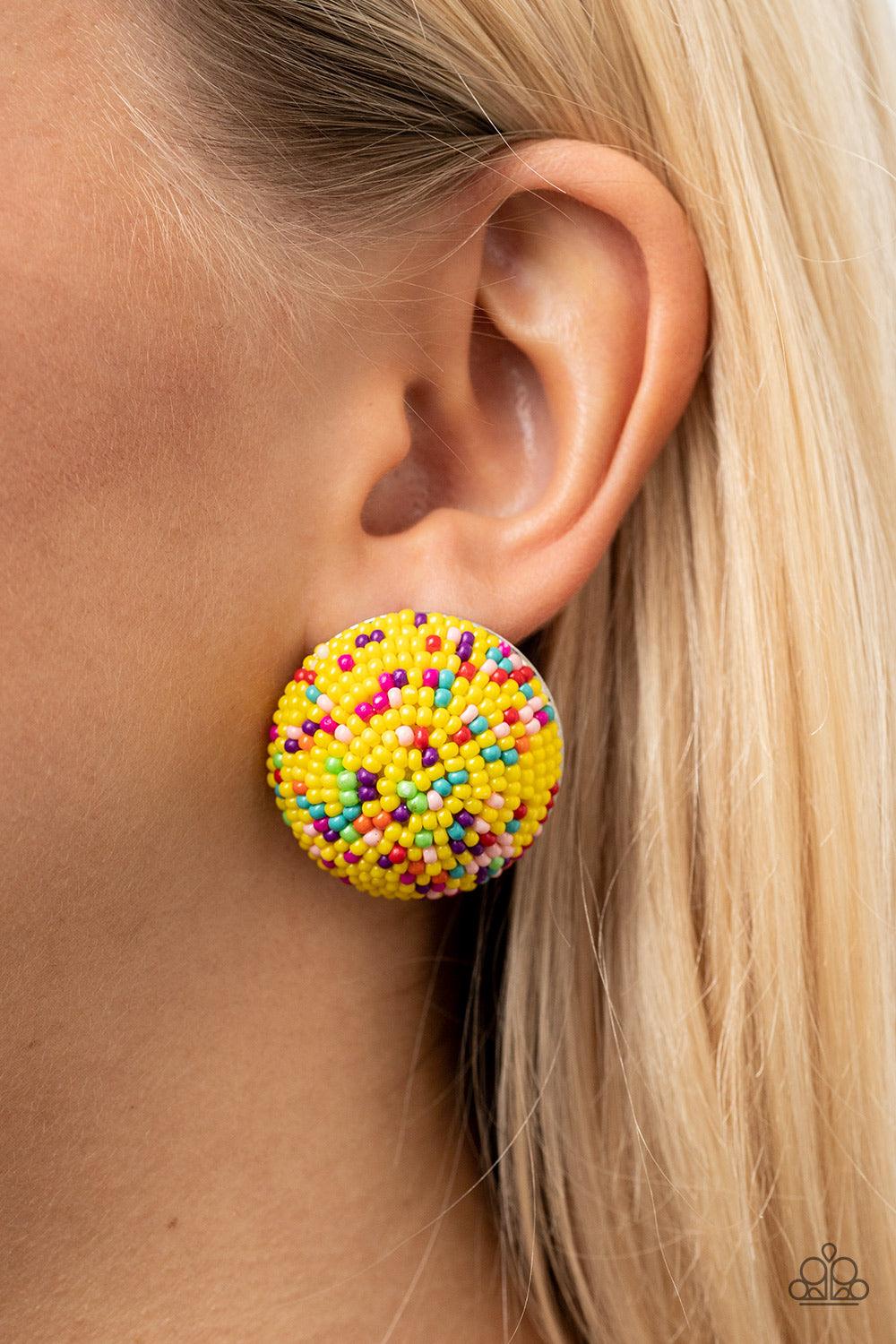 Paparazzi Accessories Kaleidoscope Sky - Yellow A bubbly assortment of dainty multicolored beads spins around the front of an oversized and beveled silver frame, resulting in a boisterous pop of kaleidoscopic color. Earring attaches to a standard post fit