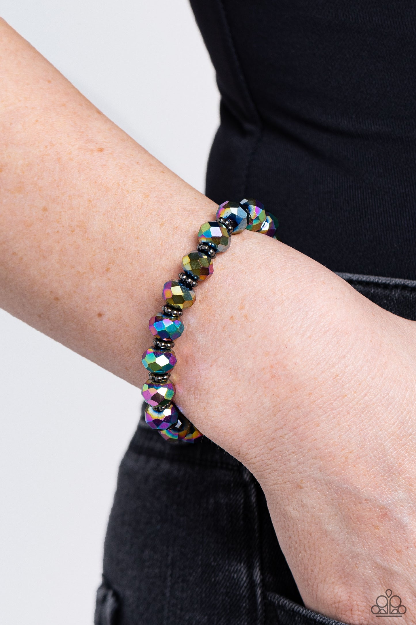 Paparazzi Accessories Shimmering Satisfaction - Multi Dipped in metallic shimmer, glittery oil spill crystal-like beads and studded gunmetal rings are threaded along a stretchy band around the wrist for a stellar fashion. Sold as one individual bracelet.