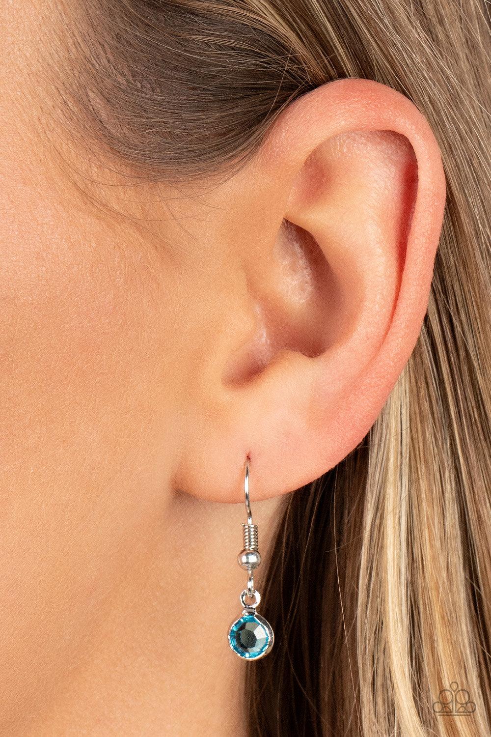 Paparazzi Accessories Carefree Charmer - Multi Encased in sleek silver fittings, a dainty collection of glassy multicolored gems twinkles along a dainty silver chain below the collar, creating a colorful fringe. Features an adjustable clasp closure. Sold