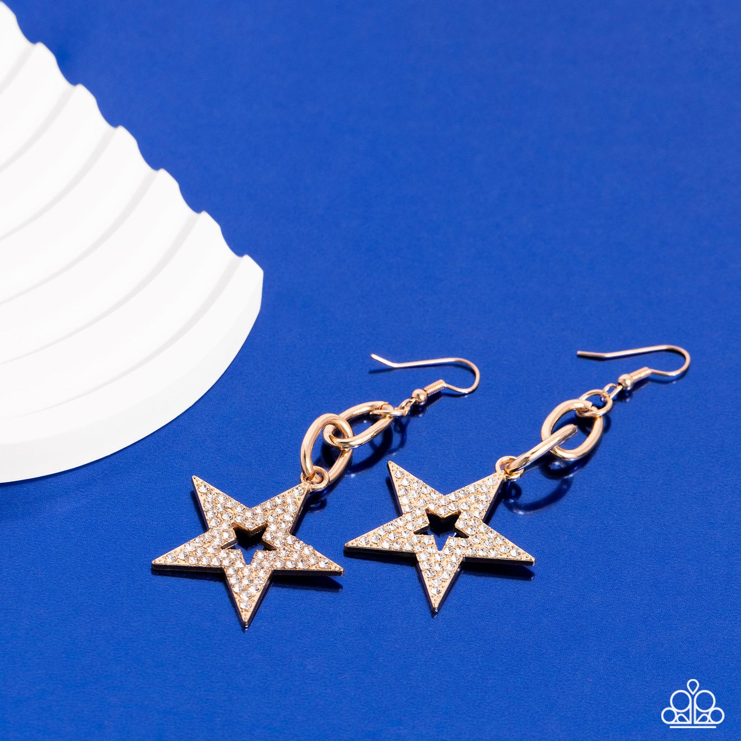 Paparazzi Accessories Cosmic Celebrity - Gold Glassy white rhinestones scatter across the front of a gold star at the bottom of a chunky gold chain, resulting in a stellar lure. Earring attaches to a standard fishhook fitting. Sold as one pair of earrings