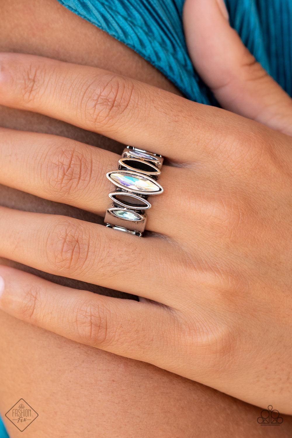 Paparazzi Accessories Distant Cosmos - Multi Featuring a stellar iridescence, marquise cut rhinestones alternate with airy silver marquise frames across the finger, coalescing into a futuristic sparkle. Features a stretchy band for a flexible fit. Due to