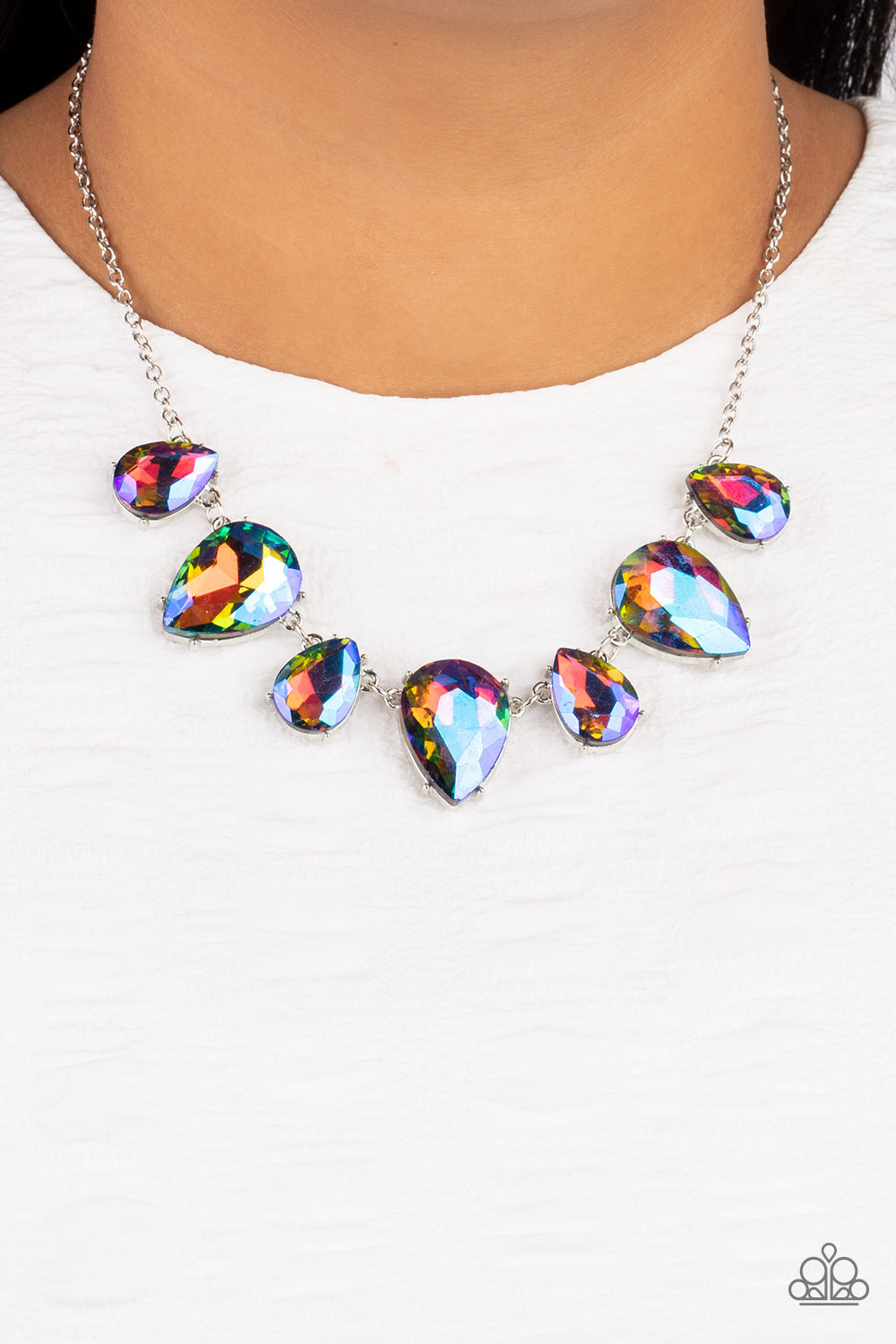 Paparazzi Accessories Otherworldly Opulence - Multi 1 Featuring a stellar iridescence, an oversized collection of glittery blue teardrop gems alternates upside down and right-side up below the collar for an out-of-this-world sparkle. Features an adjustabl