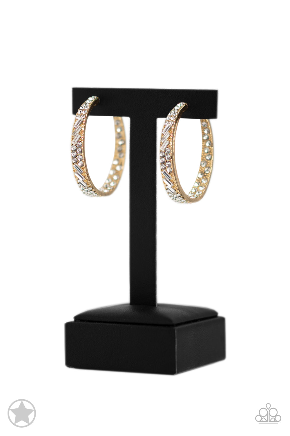 Paparazzi Accessories GLITZY By Association - Gold The front-facing surface of a chunky gold hoop is dipped in brilliantly sparkling white rhinestones while light-catching texture wraps around the back. The interior of the hoop features the opposite patte