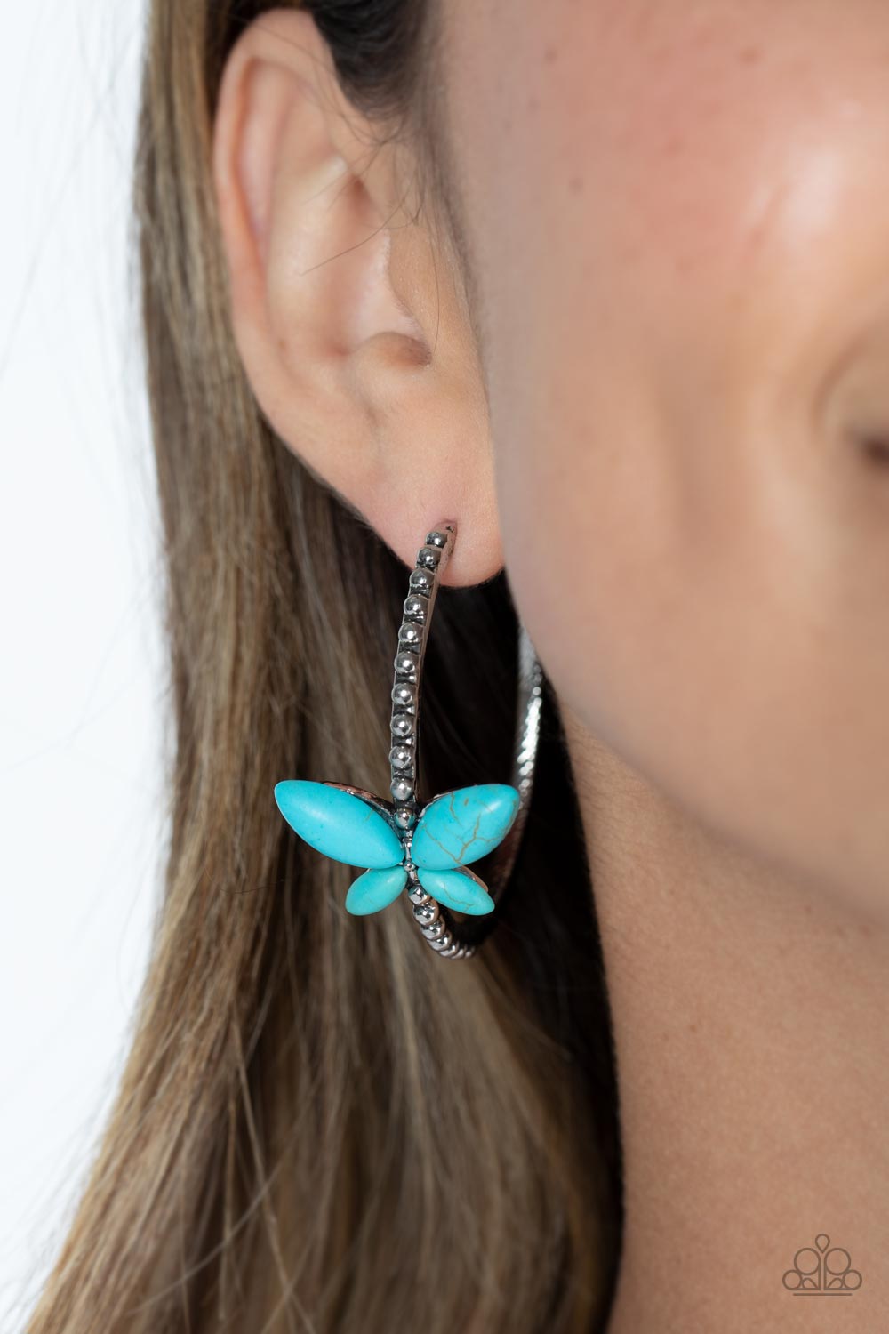 Paparazzi Accessories Bohemian Butterfly - Blue A dainty, turquoise stone butterfly flutters atop the curve of a glistening silver hoop dotted with silver studs, creating a refreshing, whimsical sight. Earring attaches to a standard post fitting. Hoop mea