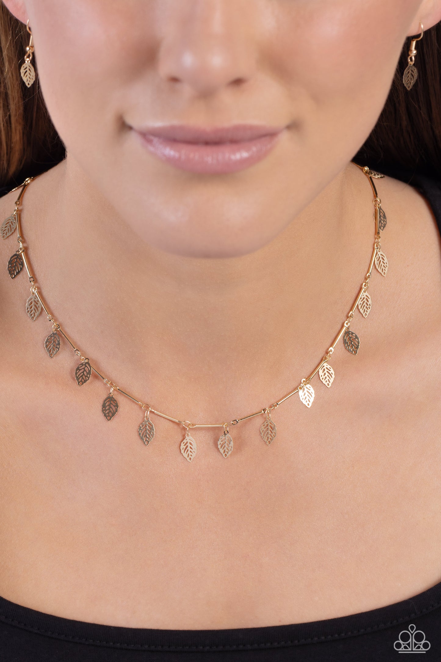 Paparazzi Accessories LEAF a Light On - Gold Skinny gold bars link together along the collar to create a dainty display of metallic sheen. A shiny gold leaf separates each bar, bringing shimmery movement to the lightweight design. Features an adjustable c