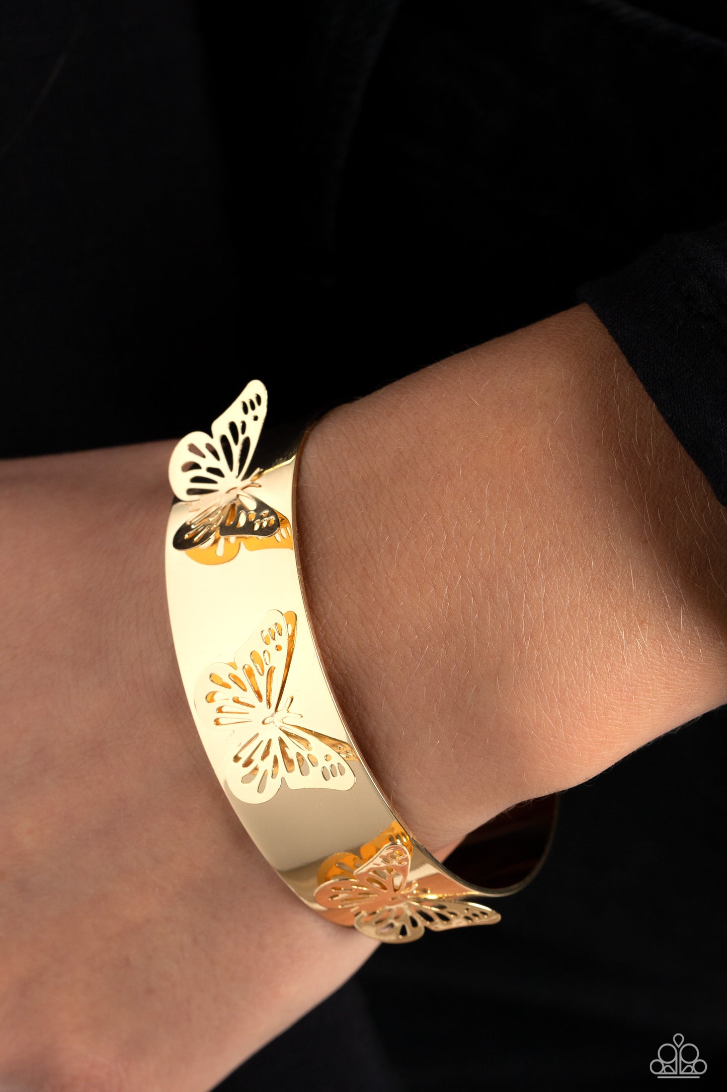 Paparazzi Accessories Magical Mariposas - Gold Three shimmery gold butterflies flutter atop the wrist on a thick gold cuff for a whimsical finish. Sold as one individual bracelet. Jewelry