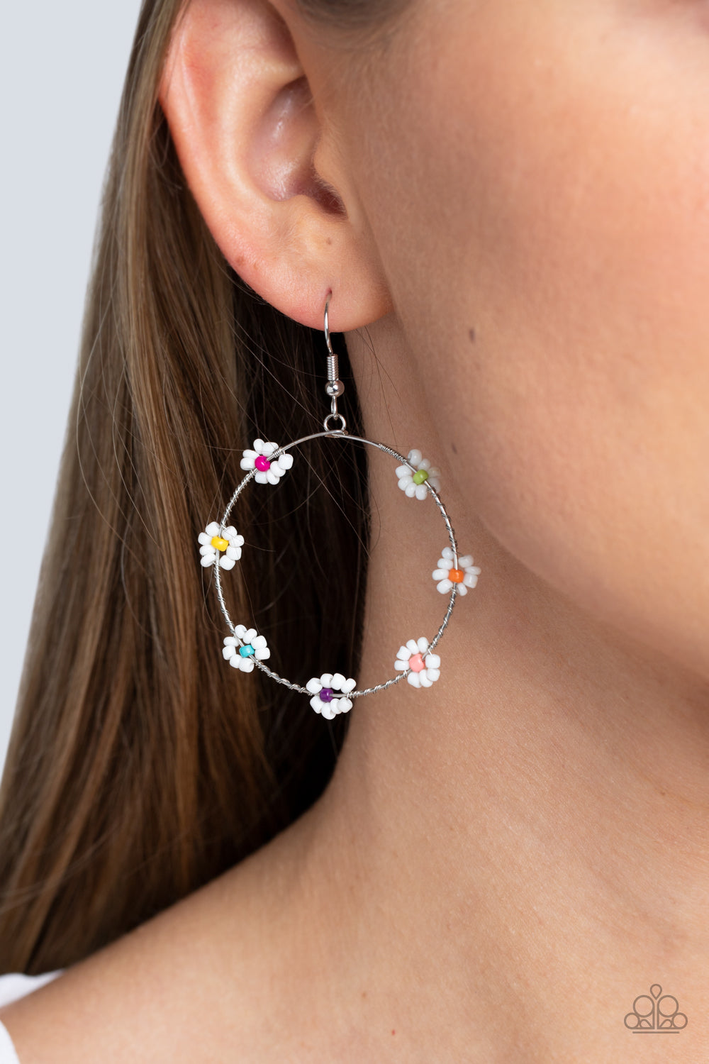 Paparazzi Accessories Dainty Daisies - Multi Dotted with yellow, blue, purple, light pink, orange, green, and hot pink seed beaded centers, a dainty collection of white seed beaded floral frames are threaded along a dainty, serrated wire hoop for a fabulo