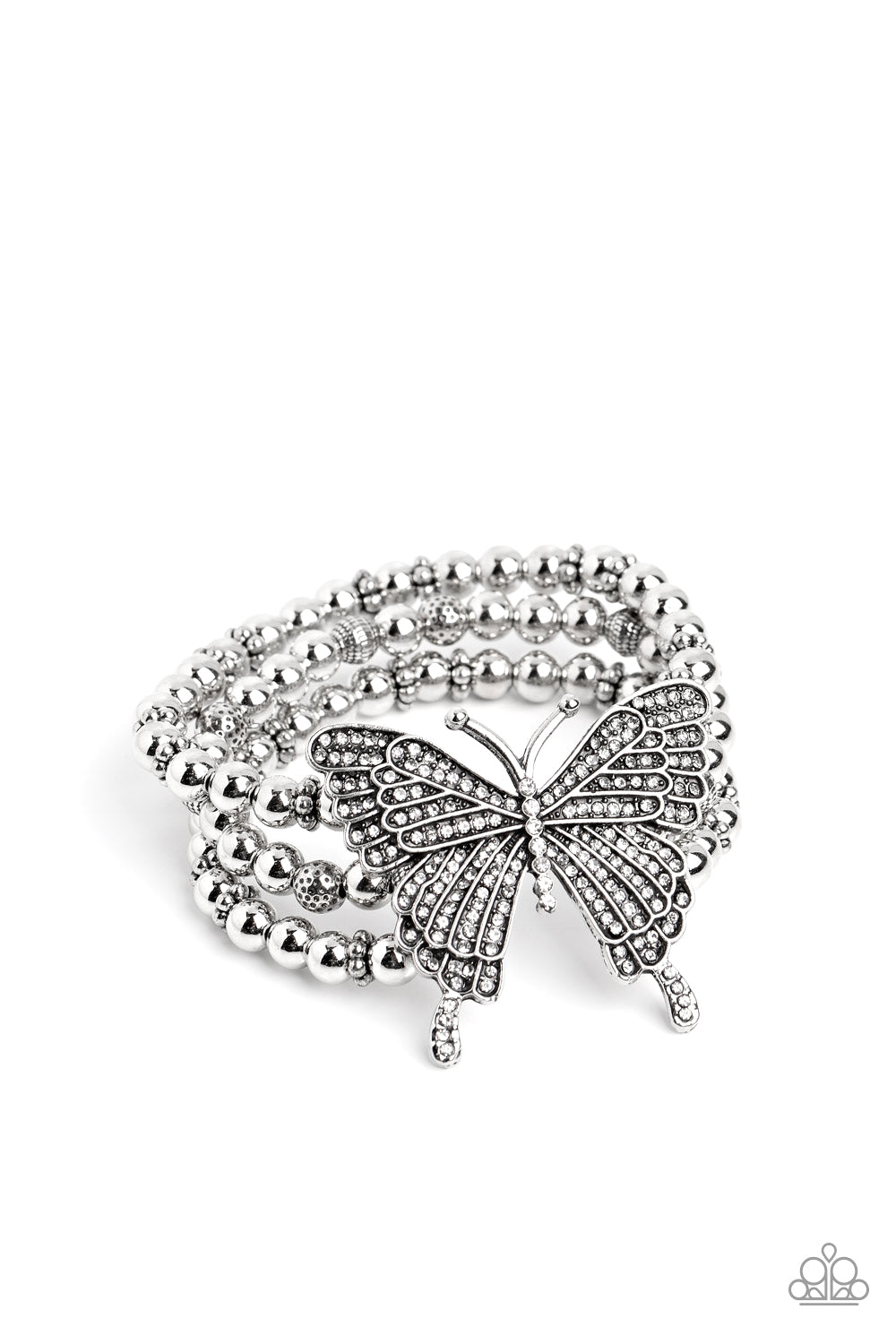 Paparazzi Accessories First WINGS First - White Strung along elastic stretchy bands, a trio of silver and textured silver beads and accents wrap around the wrist. Featured atop the beaded collection, an oversized silver butterfly, with intricate details,