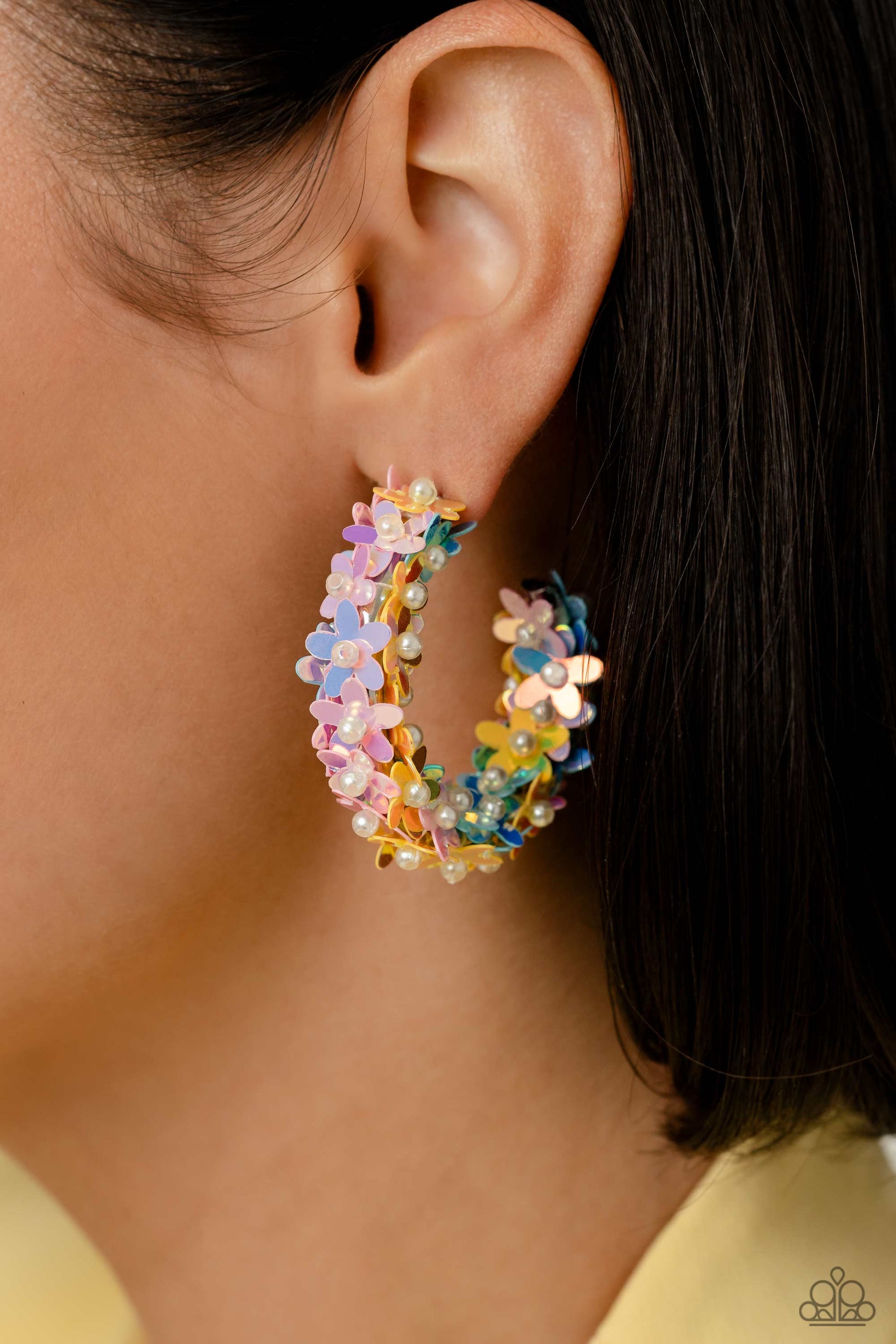 Paparazzi Accessories Fairy Fantasia - Multi A floral explosion, encompassing the entirety of a thick silver hoop, features reflective light blue, pink, and yellow flowers dotted with dainty pearl centers for a dreamy, whimsicality below the ear. Earring