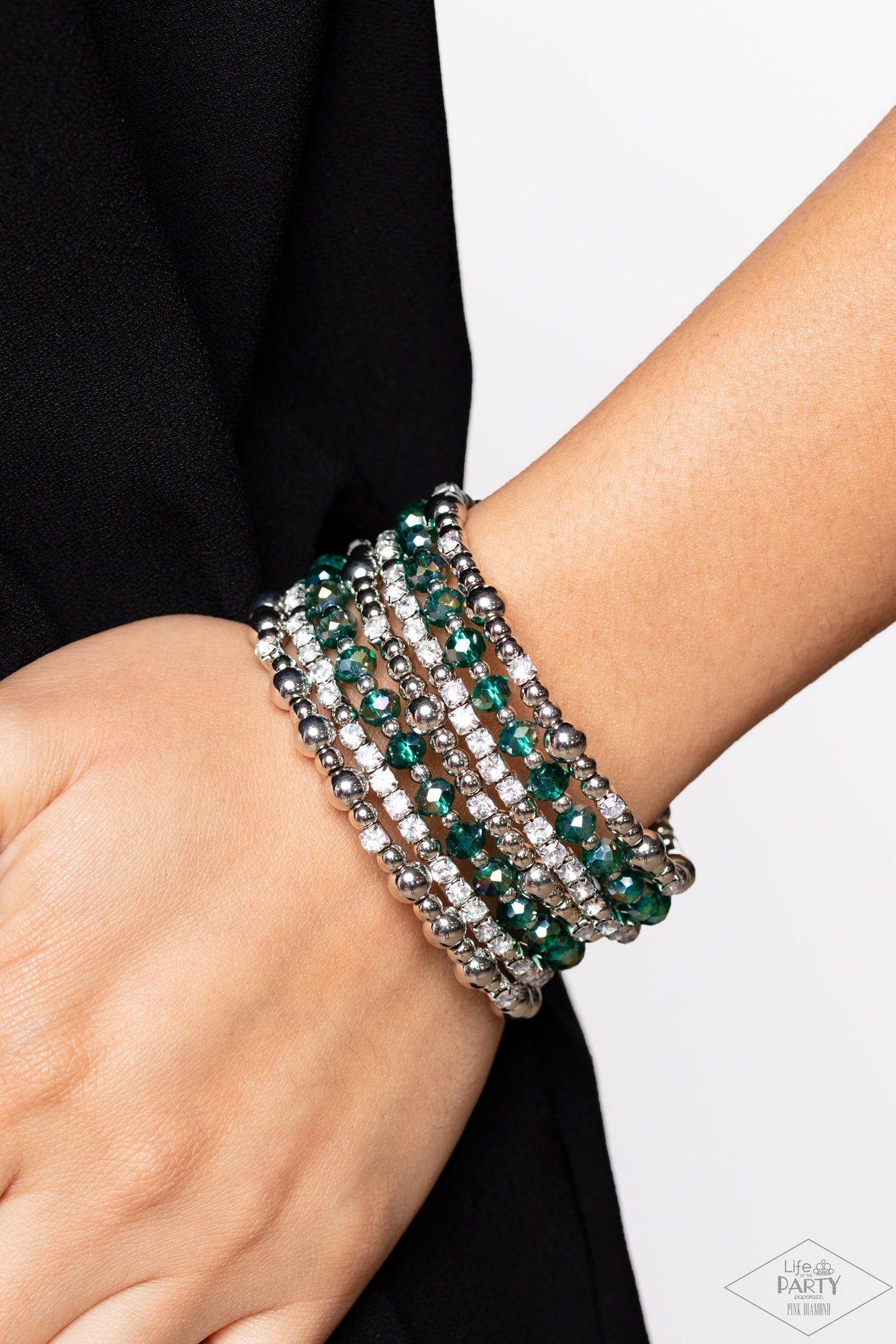 Paparazzi Accessories ICE Knowing You - Multi An icy collection of silver beads, cubes, opaque green crystals with an iridescent shimmer, and glassy white rhinestones are threaded along a coiled wire, creating a blinding infinity wrap style bracelet aroun