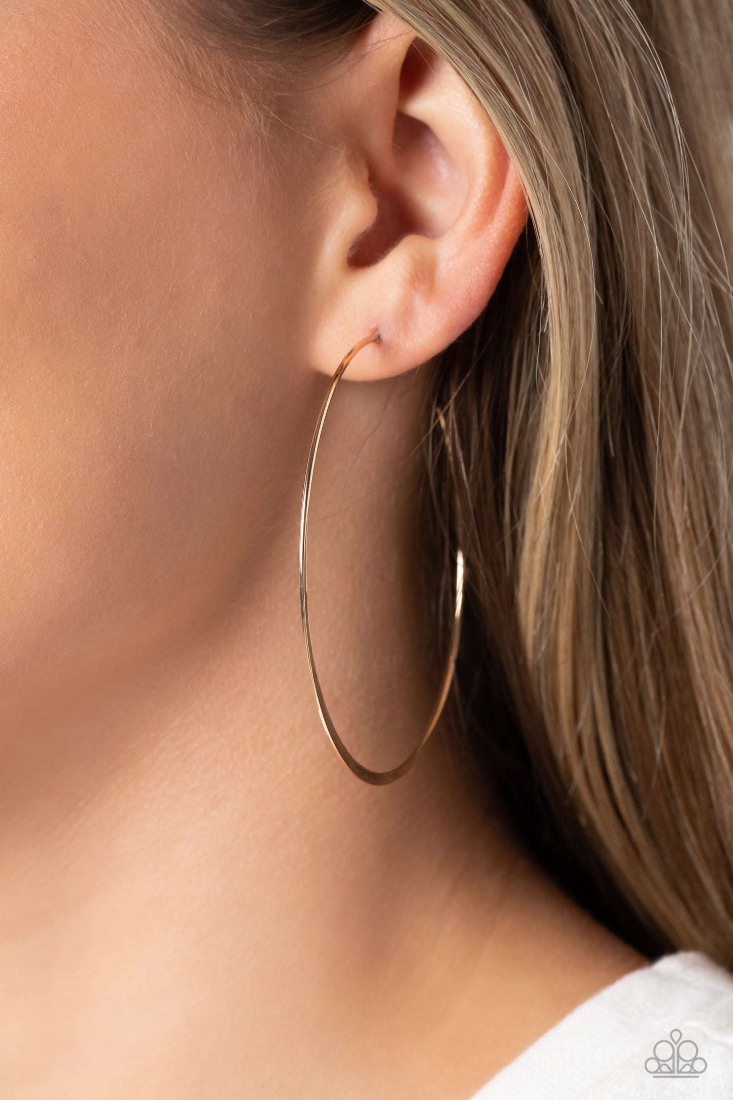 Paparazzi Accessories Metal Drama - Gold Featuring a high-sheen, a slightly flared, thin smooth gold bar curves into an oversized hoop resulting in a basic staple piece. Earring attaches to a standard post fitting. Hoop measures approximately 2 1/2" in di