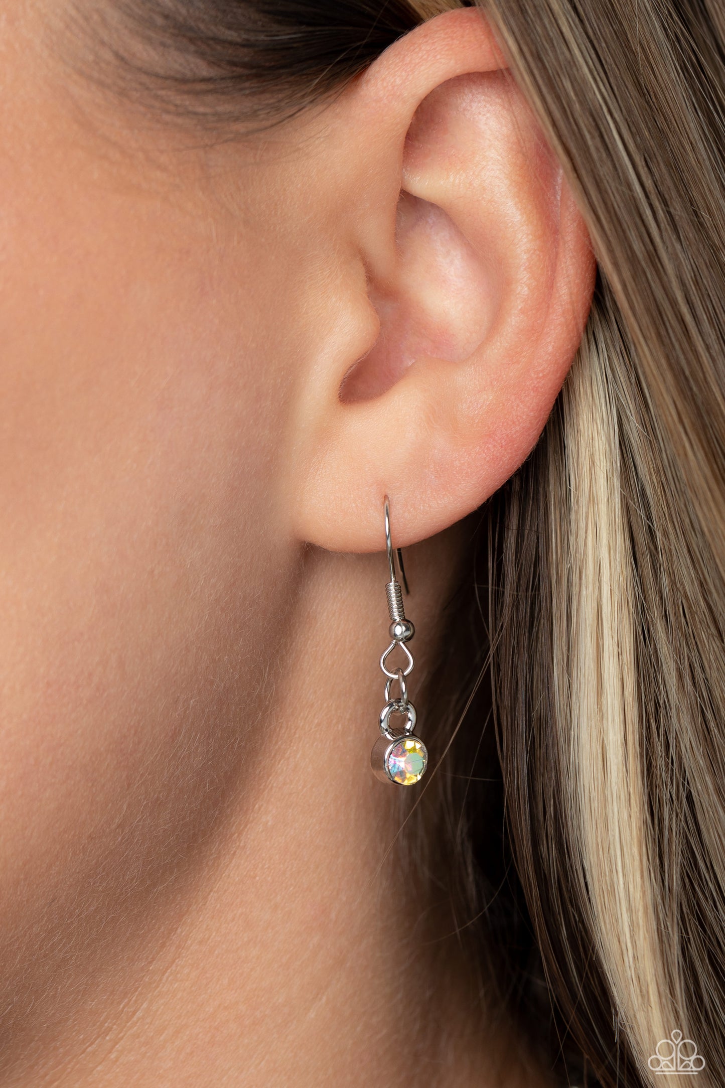 Paparazzi Accessories Radiant Romeo - Multi Hammered in antiqued texture, an oversized, abstract silver heart swings from the bottom of a silver chain for a whimsical look. Silver studs and glittery iridescent gems border the hammered texture for a touch