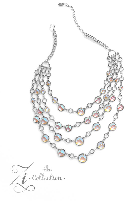 Paparazzi Accessories Hypnotic - Multi A dizzying display of silver hoops drapes across the chest in effervescent layers. Smooth, glassy beads, brushed in swirls of pastel iridescence, bubble up from some of the open, circular frames, further exaggerating