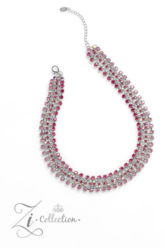 Paparazzi Accessories Flirtatious - Pink Row after row of glittery pink rhinestones fall along flexible bands of silver, encircling the neck in stunning shimmer. The top row showcases a fierce shade of fuchsia, which contrasts beautifully with the iridesc