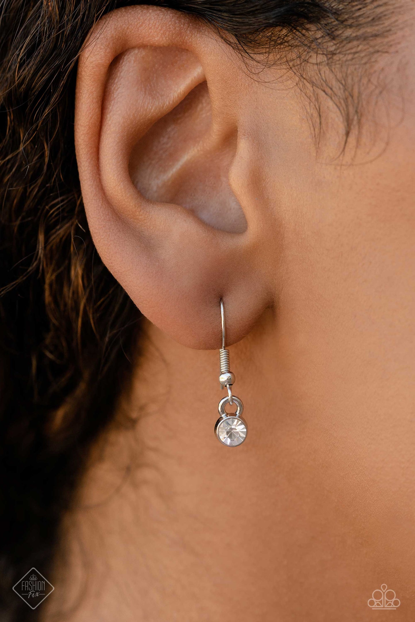 Paparazzi Accessories Tiered Talent - Blue An exaggerated white gem is encircled by a collection of emerald-cut gems in varying shades of blue, creating a hypnotic pendant that swings from a thick silver curb chain. Five additional emerald-cut gems in the