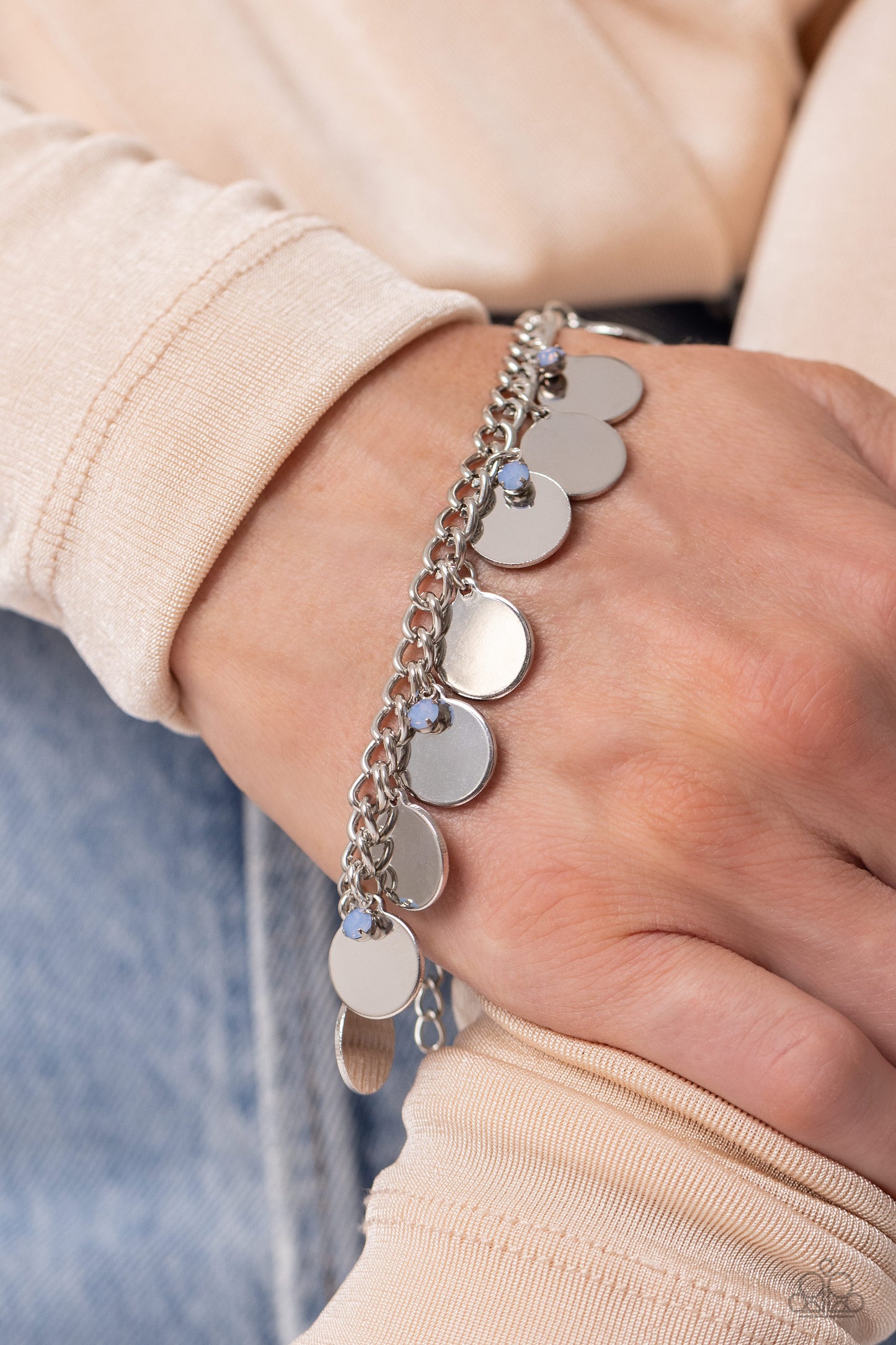 Paparazzi Accessories Dreamy Discs - Blue Dainty, opalescent blue beads dance along a silver chain alongside high-sheen silver discs for an understated girly design. Features an adjustable clasp closure. Sold as one individual bracelet. Get The Complete L