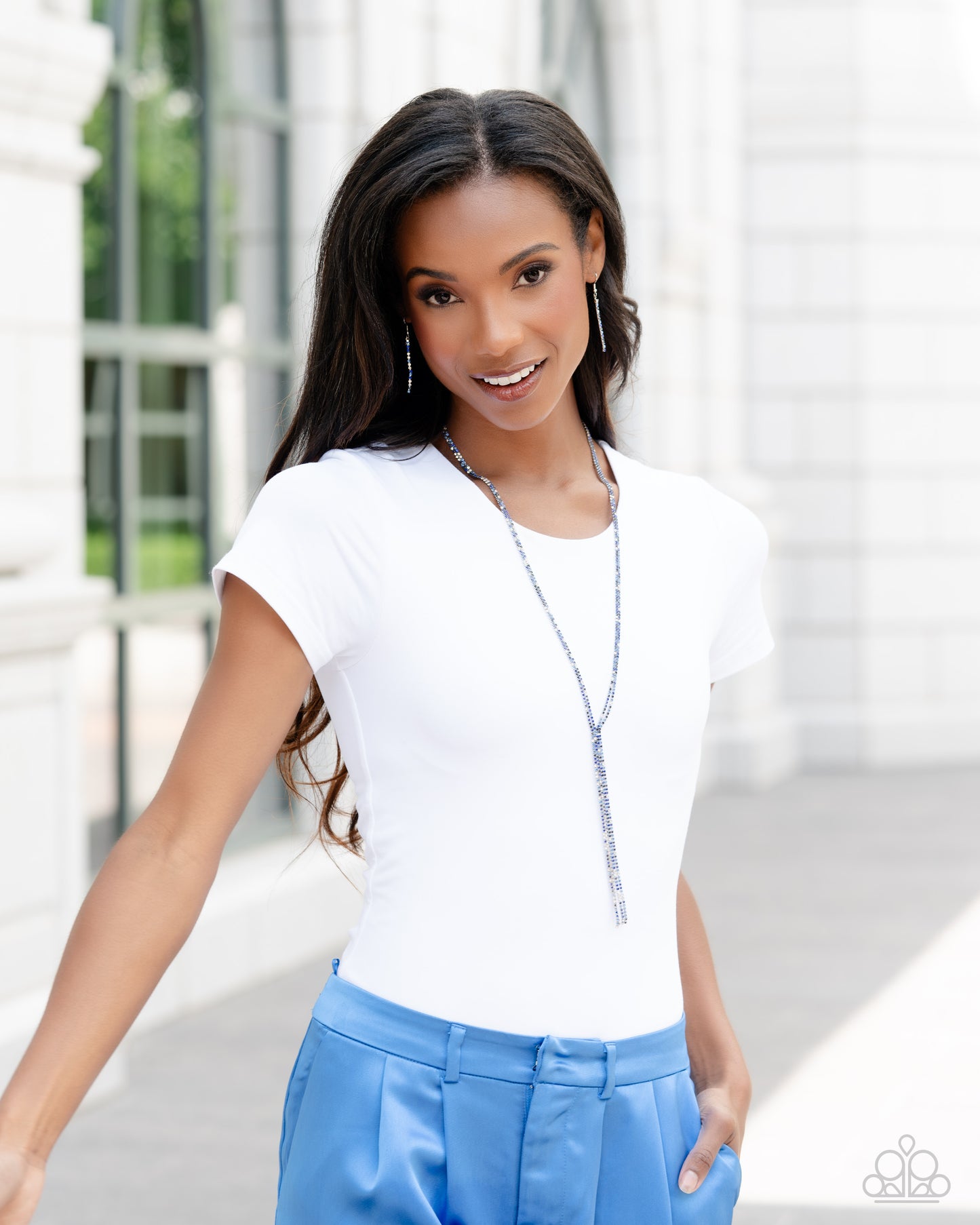 Paparazzi Accessories Jazz STRANDS - Blue Featuring sleek square fittings, two strands of glittery, dainty multicolored blue rhinestones connect down the chest for a refined centerpiece. The interconnected rows delicately give way to freefalling multicolo
