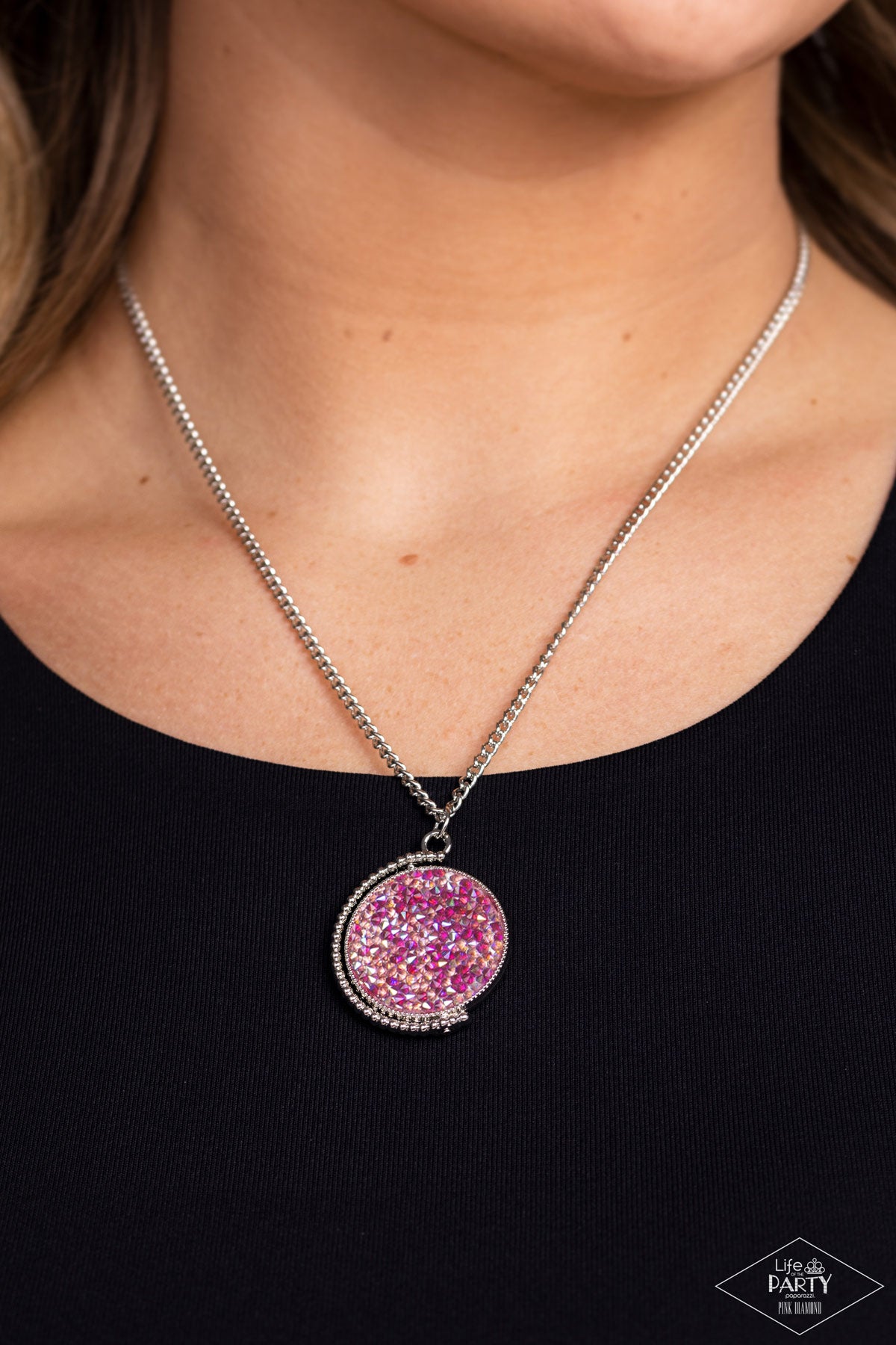 Paparazzi Accessories My Moon and Stars - Multi A smoldering collision of blue iridescent and pink iridescent rhinestones are encrusted across the front and back of a textured silver disc below the collar. Threaded along a dainty rod, the glittery pendant