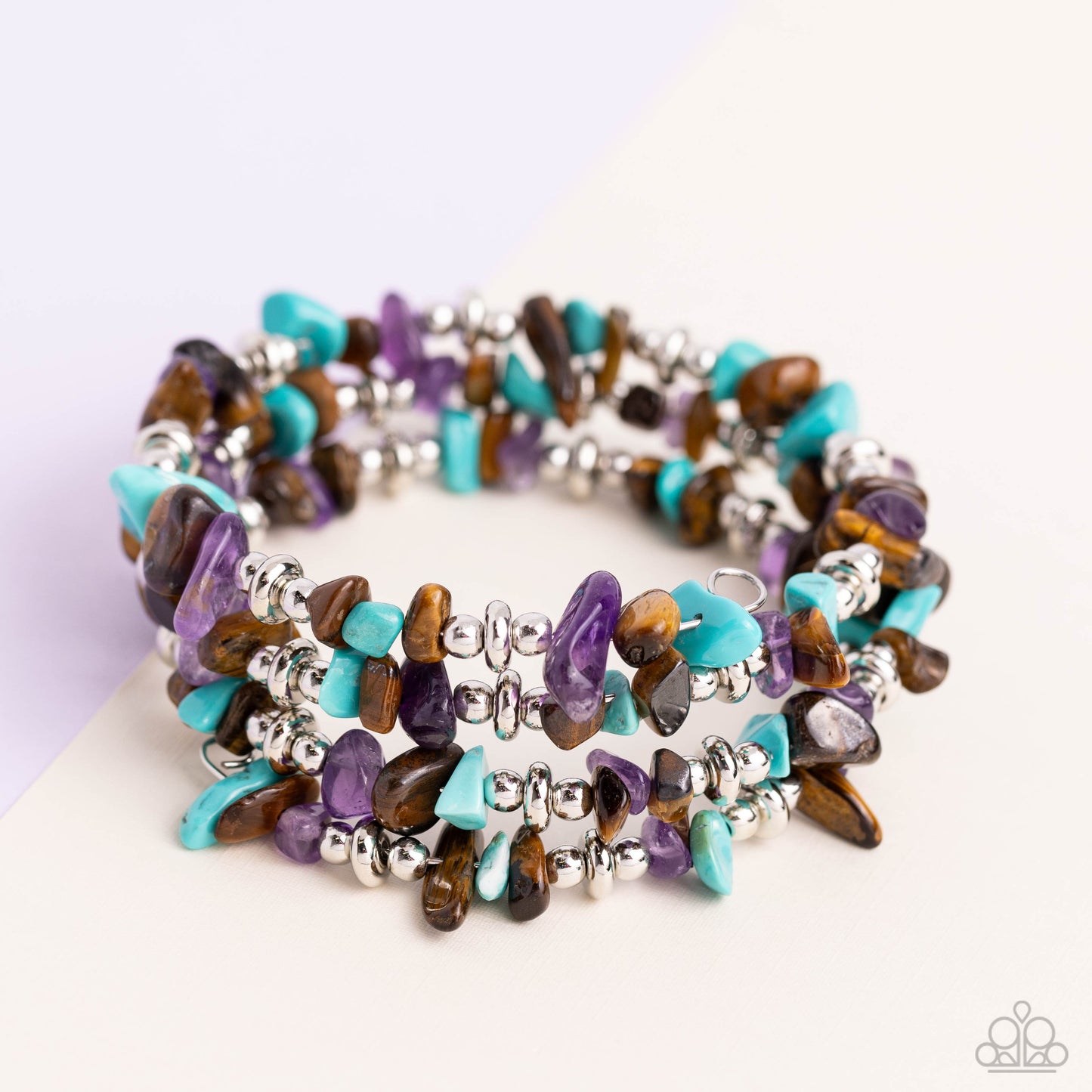 Paparazzi Accessories Stacking Stones - Brown Featuring a chiseled finish, a mismatched collection of tiger's eye, turquoise, and amethyst stones and shiny silver beads are threaded along a coiled wire, creating an earthy infinity wrap style bracelet. As