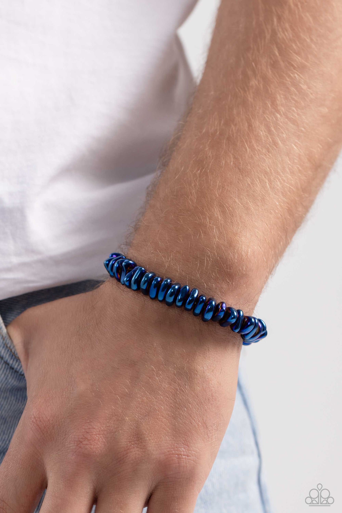 Paparazzi Accessories Monochromatic Mechanic - Blue Featuring an electric blue hue, a shiny series of irregular metallic beads are threaded along a stretchy band around the wrist for a bold pop of monochromatic detail. Sold as one individual bracelet. Jew