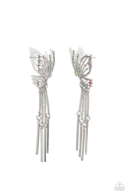 Paparazzi Accessories A Few Of My Favorite WINGS - White Featuring dainty white rhinestones and dainty marquise-cut iridescent gems, a thin, elongated, airy silver butterfly is titled to the side as if about to take off in flight. A collection of dainty s