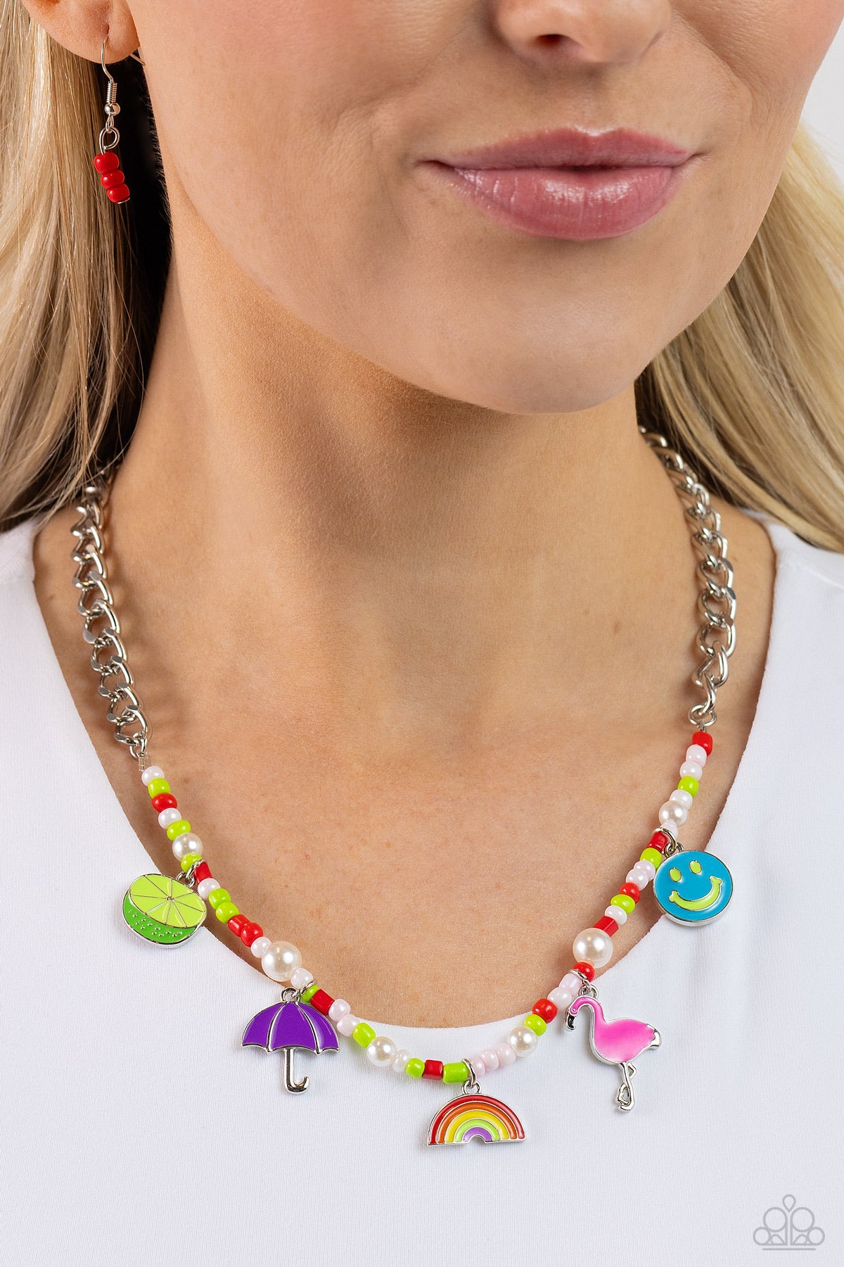 Paparazzi Accessories Summer Sentiment - Red A thick, flat silver curb chain leads down the neckline to a section of red, baby pink, and Kohlrabi seed beads and various-sized white pearls. A collection of seasonal charms gather along the colorful display,