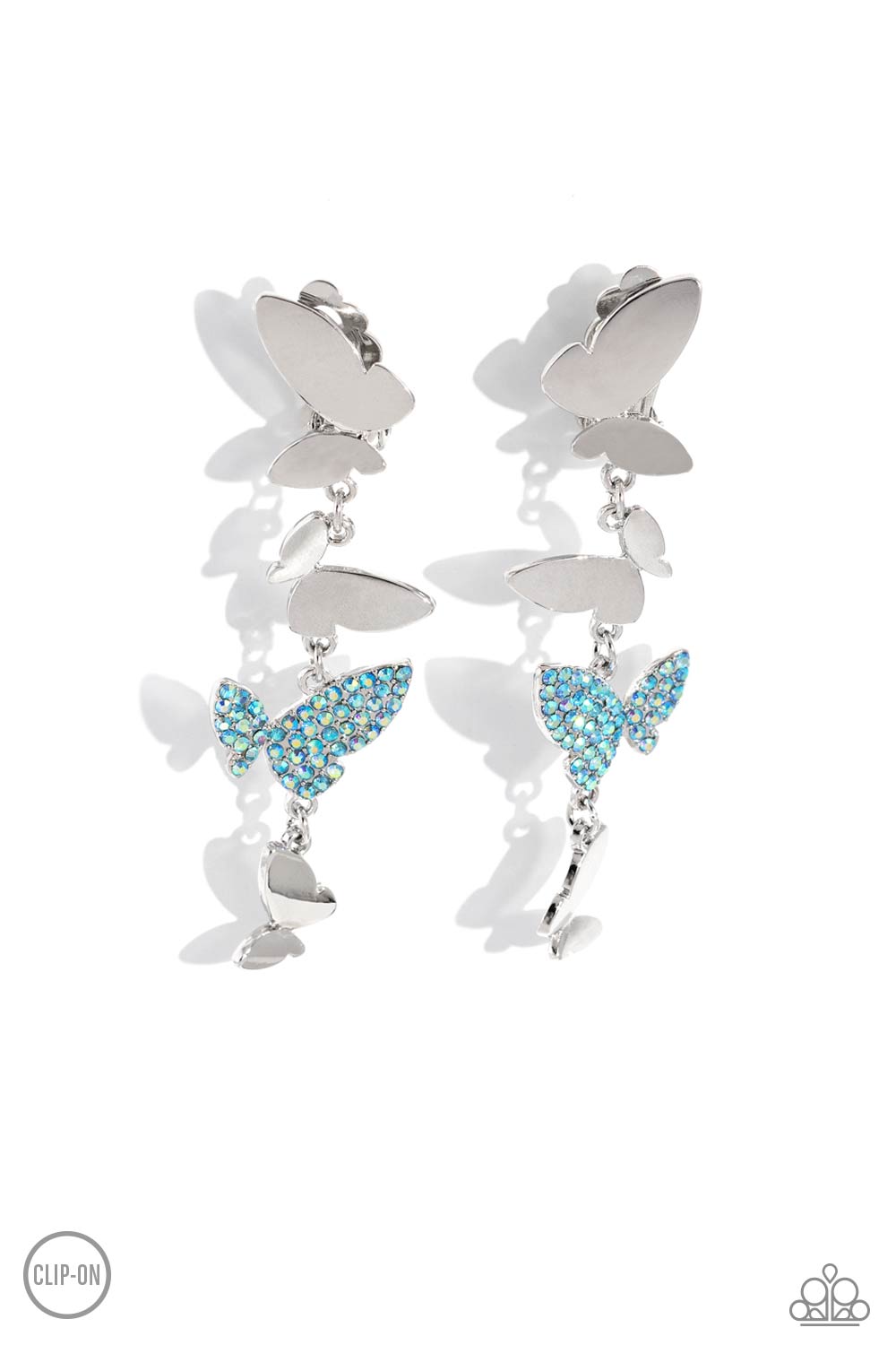 Paparazzi Accessories Flying Flashy - Blue *Clip-On Three butterflies with high-sheen silver wings and one blue iridescent-encrusted butterfly flutter down the ear, creating a free-spirited lure. Each butterfly swings in whimsical asymmetry, creating the