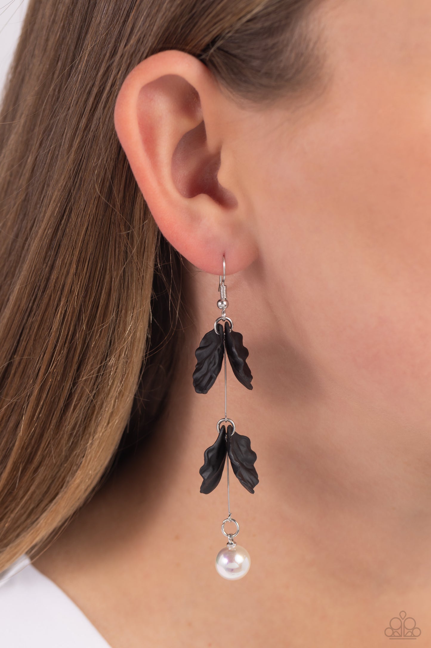 Paparazzi Accessories Edwardian Era - Black A glossy white pearl delicately links to the bottom of a sleek silver rod. Black acrylic petals cascade along the silver rod, adding a timeless twist to the classic pearl palette. Earring attaches to a standard