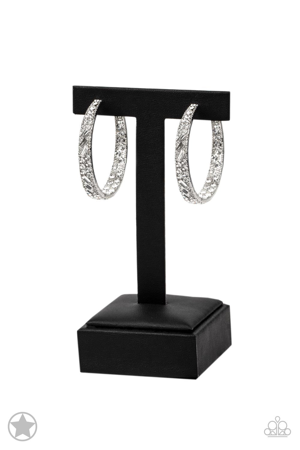 Paparazzi Accessories GLITZY By Association - White The front facing surface of a chunky silver hoop is dipped in brilliantly sparkling rhinestones while light-catching texture wraps around the back. The interior of the hoop features the opposite pattern,