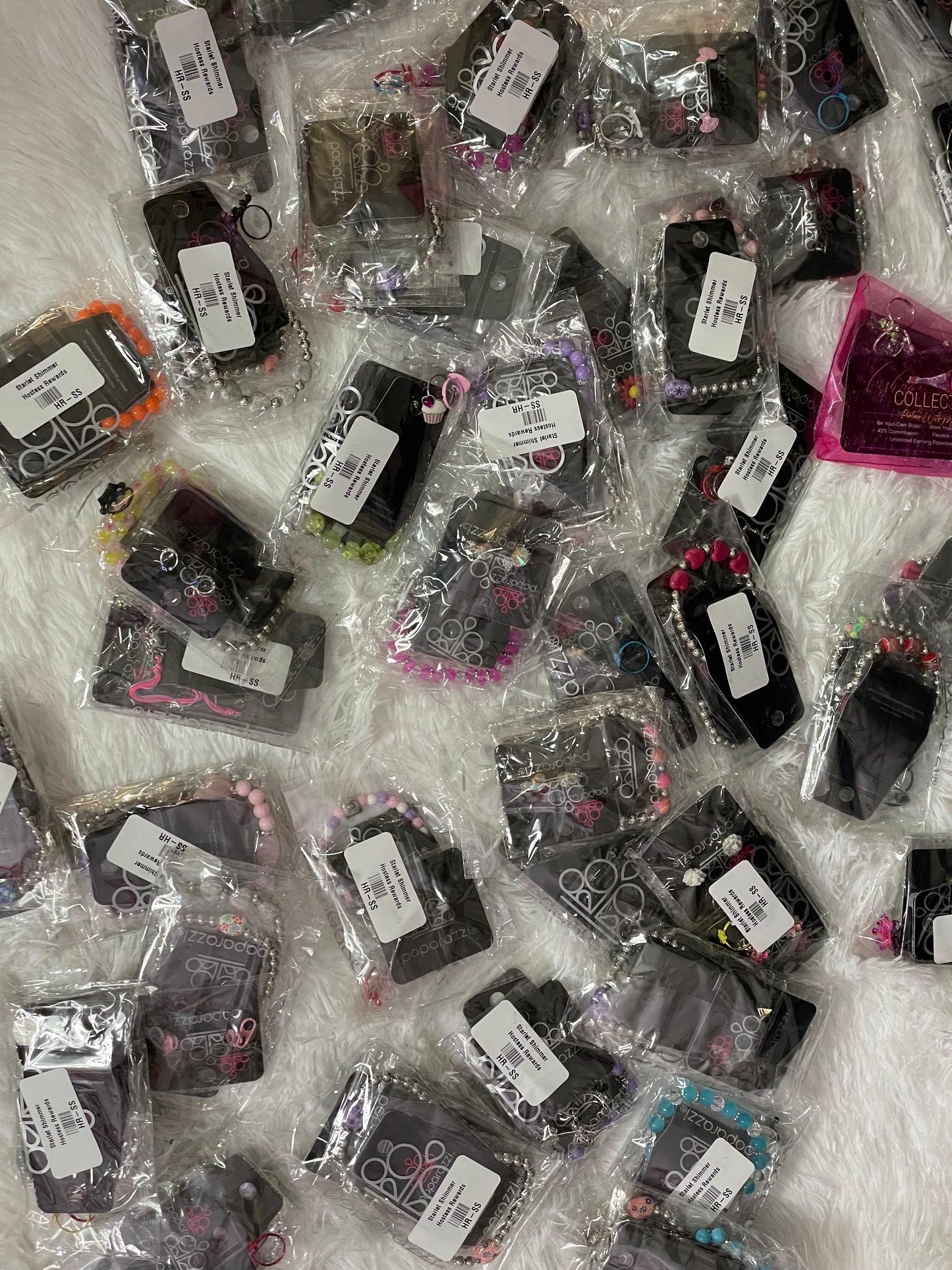 Paparazzi Accessories Starlet Shimmer: Random 5 Pack 5 Pieces of Random Junior $1 accessories Pack contains five (5) different Starlet Shimmer accessories. You will receive a mix of bracelets, rings, and earrings; the pieces you receive may not be picture