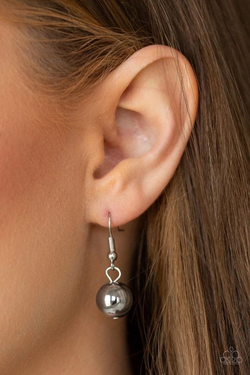 Paparazzi Accessories Colorfully Confident - Blue A collection of classic silver beads, ornate silver accents, and metallic blue faux rock beads are threaded along an invisible wire below the collar for a statement-making finish. Features an adjustable cl