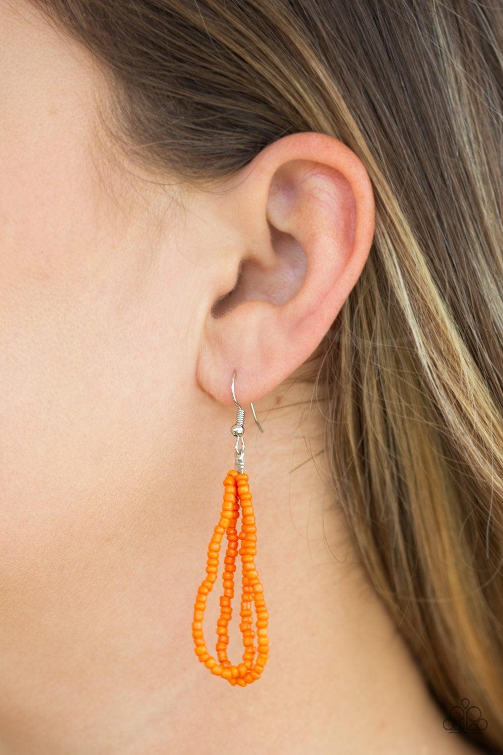 Paparazzi Accessories The Show Must CONGO On - Orange Infused with two bold silver fittings, countless strands of vivacious orange seed beads drape below the collar for a seasonal look. Features an adjustable clasp closure. Jewelry