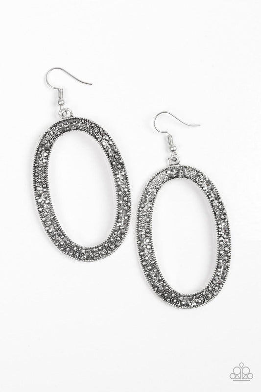 Paparazzi Accessories Rhinestone Rebel - Silver Glistening silver studs and glittery hematite rhinestones are sprinkled along an ornate silver hoop for an edgy look. Earring attaches to a standard fishhook fitting. Jewelry