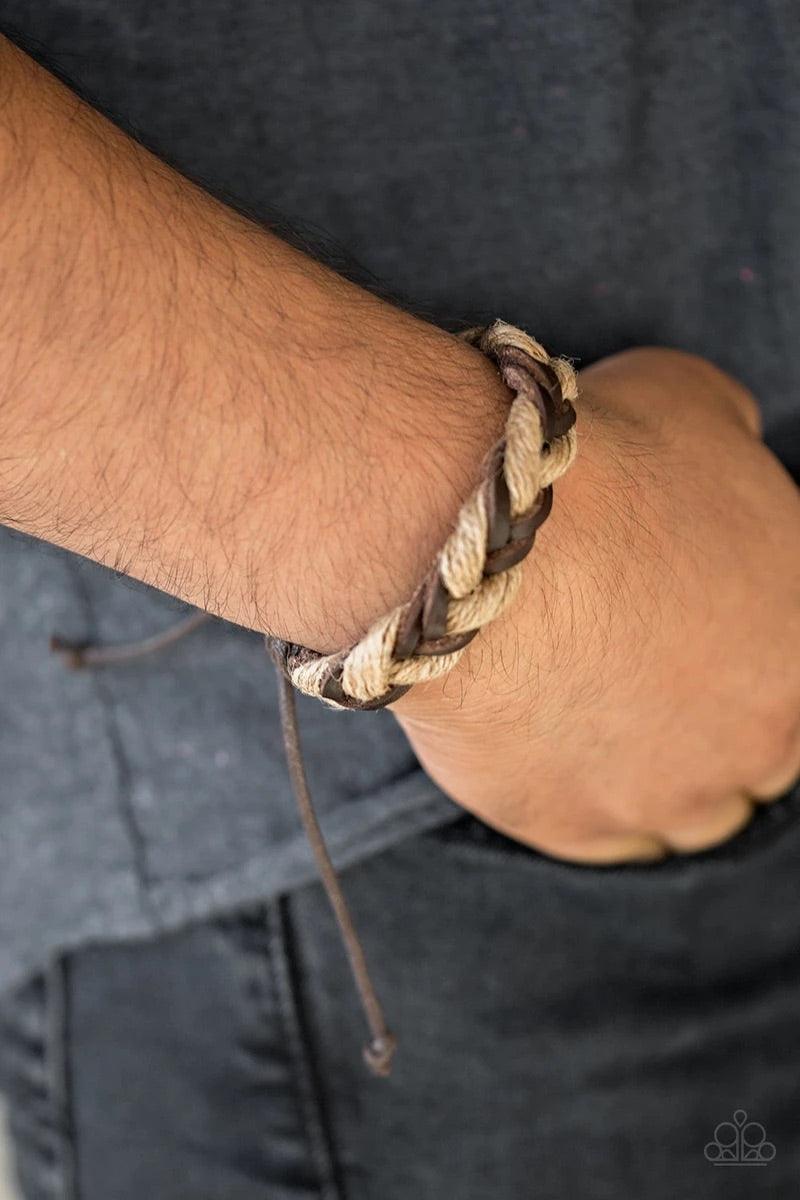 Paparazzi Accessories Trail Marker - Brown Product Description Brown leather cording and earthy strands of twine braid across the wrist for a seasonal look. Features an adjustable sliding knot closure. Sold as one individual bracelet. Jewelry